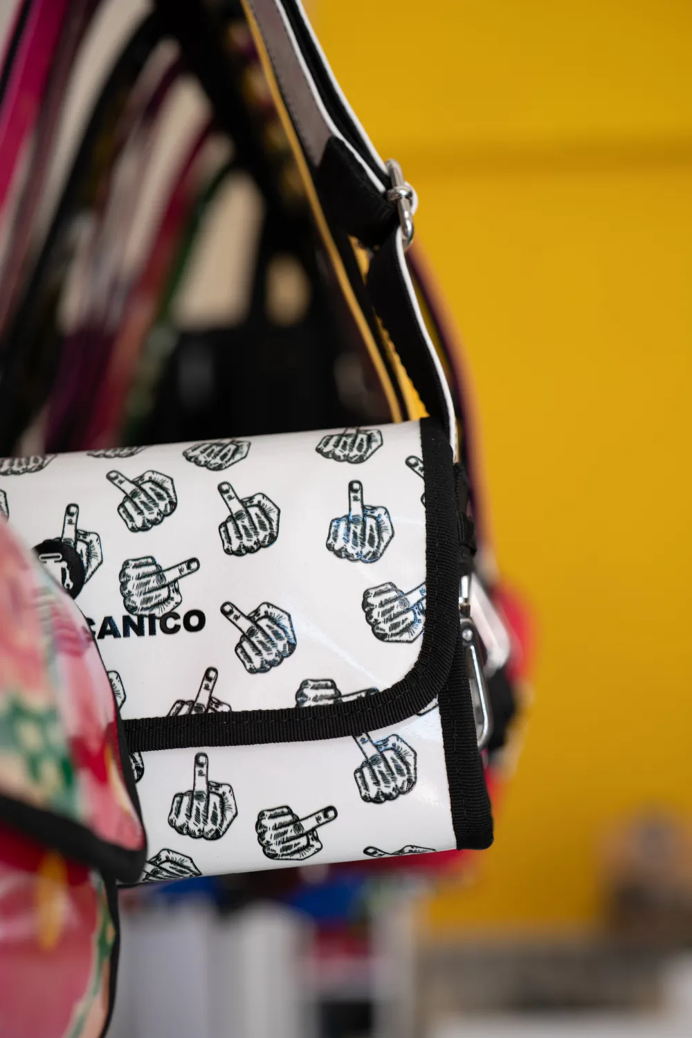 Paul Meccanico close up candy with finger in new store 01